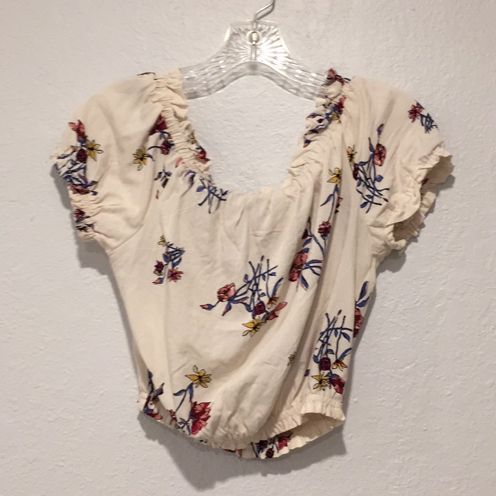 Light pink crop top. Off the shoulder.